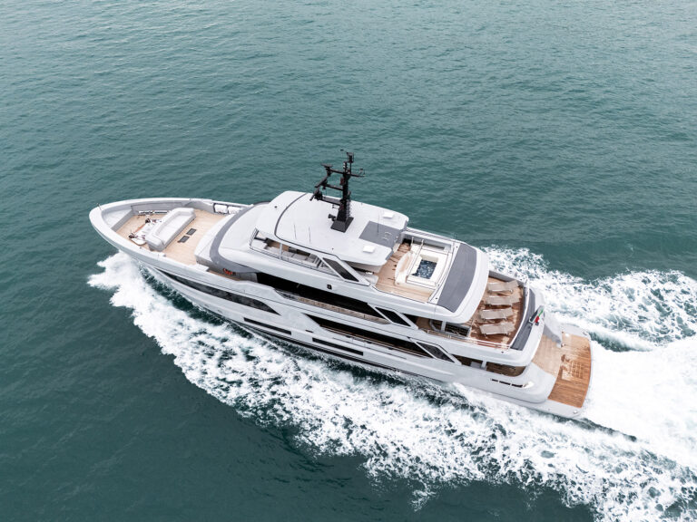 Aerial view of Pazienza underway at speed on open Pacific waters